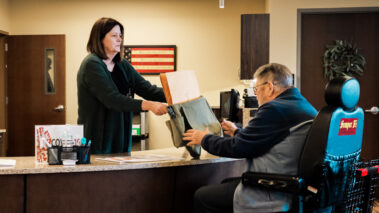 staff helping resident