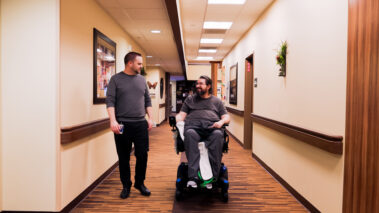 two men in hallway